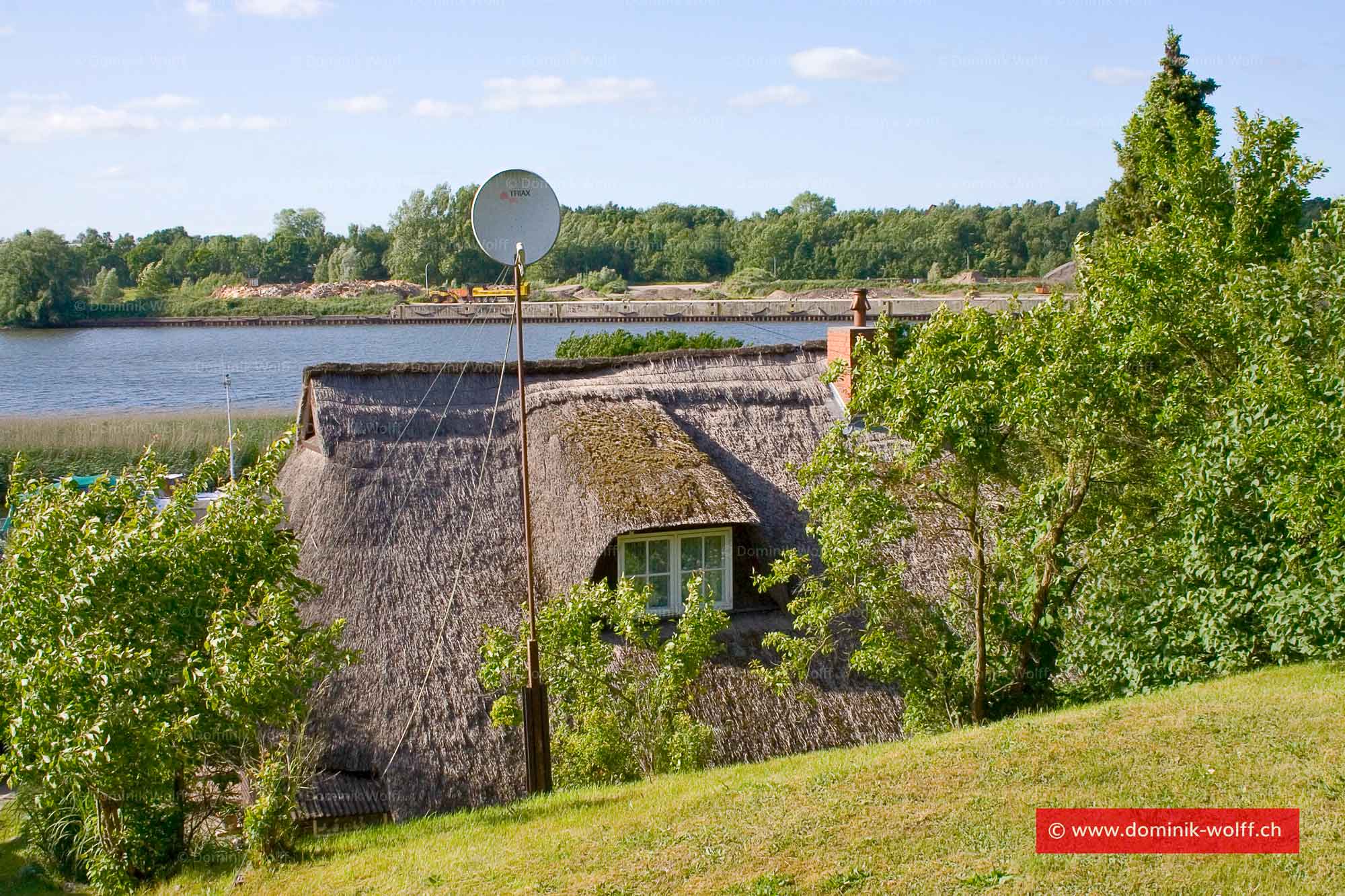 Bild + Foto - Reetdachhaus in Schleswig-Holstein